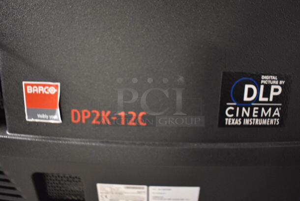 MARVELOUS! 2015 Barco Model DP2K-12C Commercial Countertop DLP Cinema Projector on Cabinet w/ Film-Tech FT21 Automation Cinema System, Gefer Cinema Scaler Pro III, Dolby CP750 Digital Cinema Processor, DCM Powercom, TV Monitor and Tripp Lite Surge Protector. 200-240 Volts. See Lot 14 For Additional Pictures! 26x38x22, 24x53x38. BUYER MUST REMOVE. Tested and Working! - Image 7 of 12