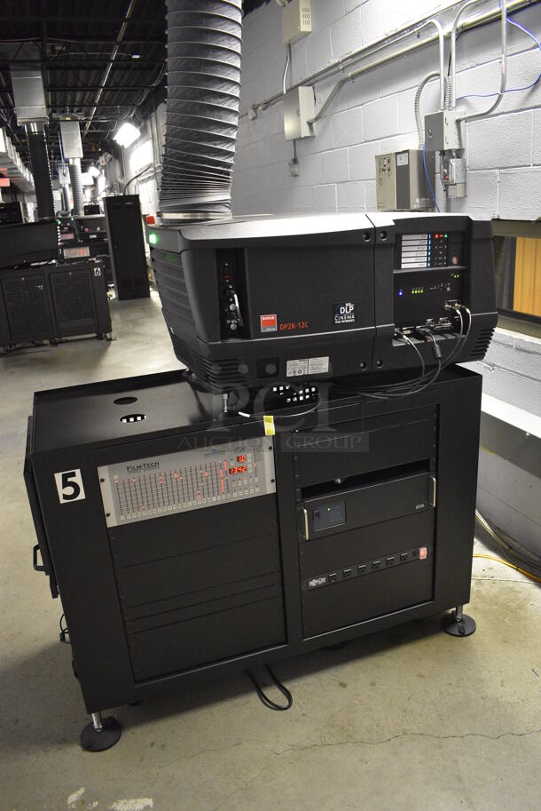 MARVELOUS! 2014 Barco Model DP2K-12C Commercial Countertop DLP Cinema Projector on Cabinet w/ Film-Tech FT21 Automation Cinema System, Gefer Cinema Scaler Pro III, Dolby CP750 Digital Cinema Processor, DCM Powercom, TV Monitor and Tripp Lite Surge Protector. 200-240 Volts. See Lot 20 For Additional Pictures! 26x38x22, 24x53x38. BUYER MUST REMOVE. Tested and Working! - Image 2 of 12