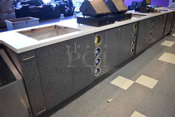 Serving Counter w/ Gray Doors, White Countertop and 16 Rear In Counter Cup Dispensers. Approximately 450" Wide See Picture For Dimensions. BUYER MUST REMOVE - Image 4 of 10