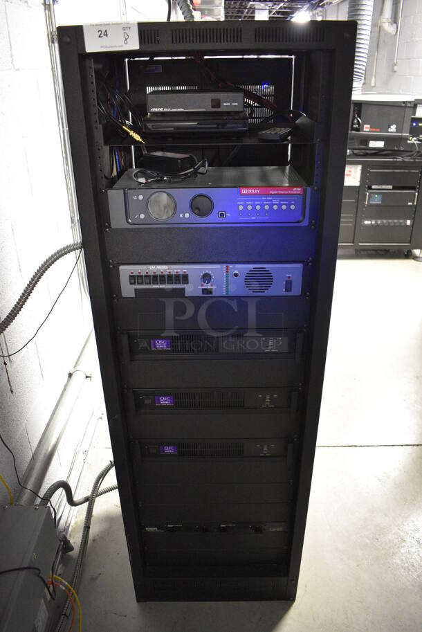 8 FANTASTIC! Items In Black Metal Rack Unit; Inline CTL101 Central Interface, Memorex Unit, Dolby CP750 Digital Cinema Processor, CM Series, 3 QSC BCA1622 Digital Cinema Amplifiers and Component Engineering LS-30-M. 22.5x22x69. 8 Times Your Bid! - Image 1 of 11