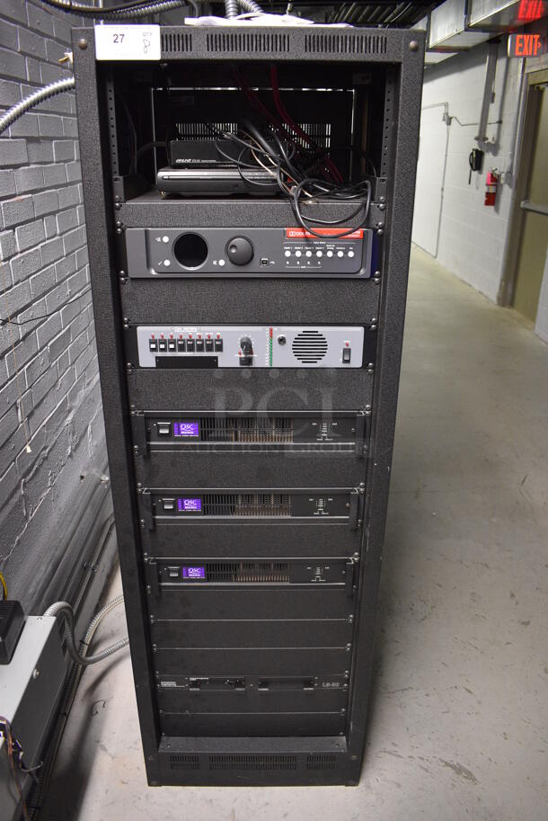 8 FANTASTIC! Items In Black Metal Rack Unit; Inline CTL101 Central Interface, Unit, Dolby CP750 Digital Cinema Processor, CM Series, 3 QSC BCA1622 Digital Cinema Amplifiers and Component Engineering LS-30-M. 22.5x22x69. 8 Times Your Bid! - Image 1 of 11