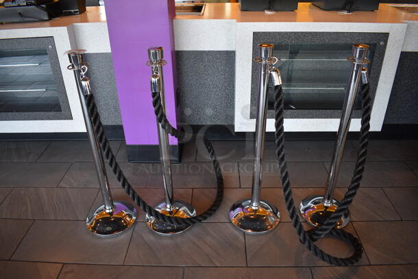 4 Chrome Finish Stanchions w/ 2 Black Ropes. 11.5x11.5x39. 4 Times Your Bid! - Image 1 of 5