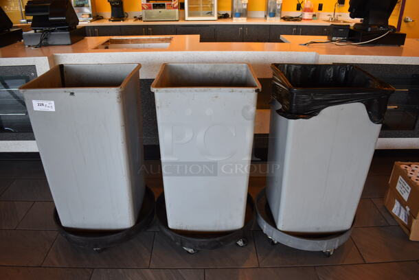 3 Gray Poly Trash Cans on 3 Trash Can Dollies. 19.5x19.5x34, 24.5x24.5x7. 3 Times Your Bid! - Image 1 of 3