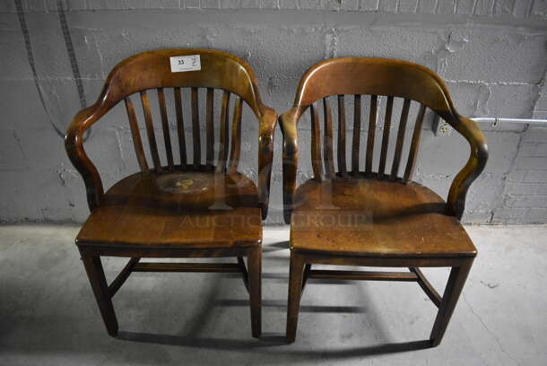 2 Wooden Dining Chairs w/ Arm Rests. 24x20x31. 2 Times Your Bid!