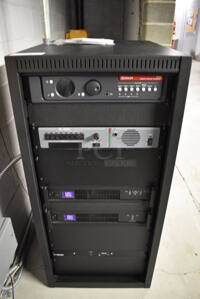 5 FANTASTIC! Items In Black Metal Rack Unit; Dolby CP750 Digital Cinema Processor, CM Series Monitor, 2 QSC BCA1622 Digital Cinema Amplifiers and Kelmar Unit. 22x28x46.5. 5 Times Your Bid!