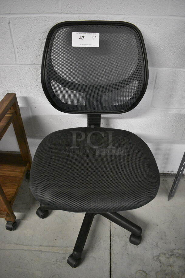 Black Office Chair on Casters. 18x19x34