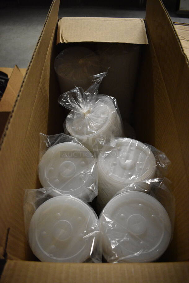4 Boxes of Clear Plastic Lids. 4 Times Your Bid!