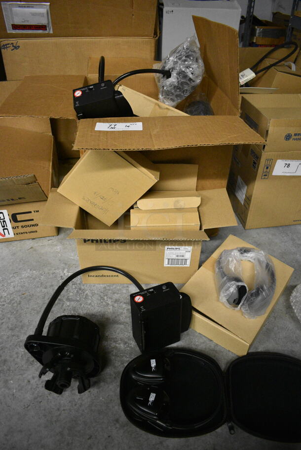 ALL ONE MONEY! Lot of 2 Boxes of Various Items Including Headphones for Hard of Hearing and Cupholder Caption Boxes for Deaf.  - Image 1 of 7