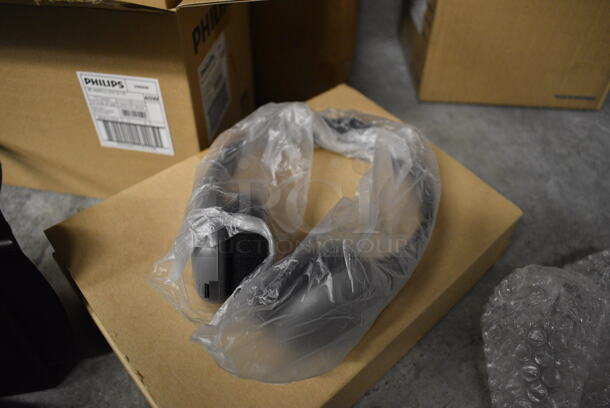 ALL ONE MONEY! Lot of 2 Boxes of Various Items Including Headphones for Hard of Hearing and Cupholder Caption Boxes for Deaf.  - Image 4 of 7