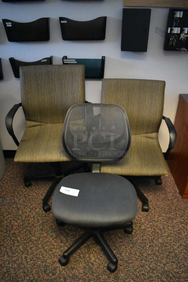 3 Office Chairs on Casters; 2 w/ Arm Rests. Includes 23.5x20x33. 3 Times Your Bid!