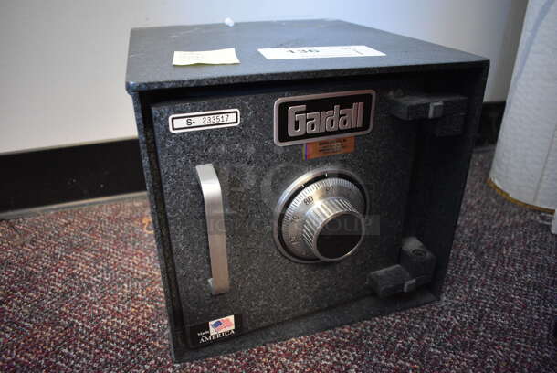 Gardall Gray Metal Single Compartment Safe. Currently Locked. 11.5x13x10. BUYER MUST REMOVE - Bolted To The Floor. 