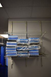 White Wall Mount 2 Tier Shelf w/ Contents. 36x17x49. BUYER MUST REMOVE