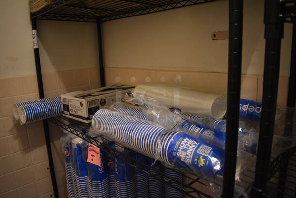 ALL ONE MONEY! Lot of Black 4 Tier Metro Style Shelving Unit w/ Contents! 48x18x74. BUYER MUST DISMANTLE. PCI CANNOT  DISMANTLE FOR SHIPPING. PLEASE CONSIDER FREIGHT CHARGES. - Image 4 of 5