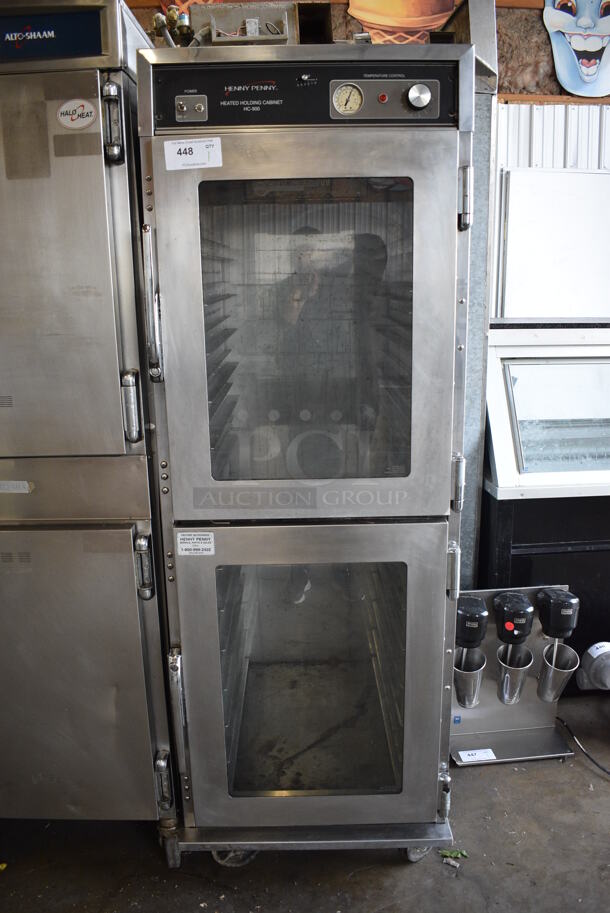 NICE! Henny Penny Model HC-900 Stainless Steel Commercial 2 Half Size View Through Door Warming Cabinet on Commercial Casters. 120 Volts, 1 Phase. 24.5x31.5x71.5. Cannot Test Due To Plug Style