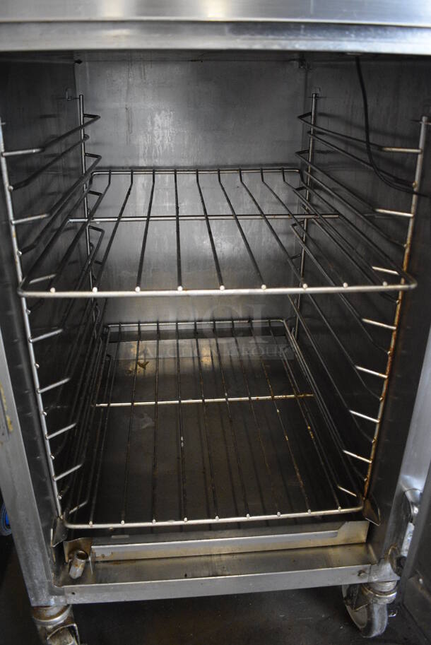 AWESOME! 2012 Alto Shaam Model 1200-TH/III Stainless Steel Commercial Holding Cabinet w/ 2 Half Size Doors on Commercial Casters. 208-240 Volts, 1 Phase. 22x30x75 - Image 6 of 7