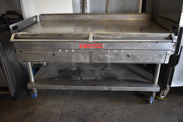 BEAUTIFUL! Vulcan Stainless Steel Commercial Flat Top Griddle w/ Thermostatic Controls and Metal Undershelf on Commercial Casters. 65x35x37