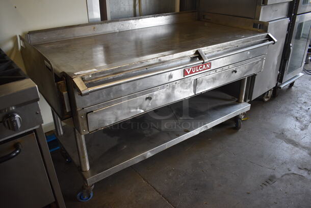 BEAUTIFUL! Vulcan Stainless Steel Commercial Flat Top Griddle w/ Thermostatic Controls and Metal Undershelf on Commercial Casters. 65x35x37 - Image 2 of 6