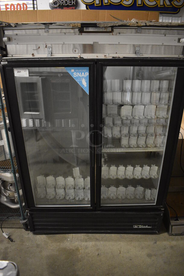 NICE! True Model GDM-49 Metal Commercial 2 Door Reach In Cooler Merchandiser w/ Poly Coated Racks and Drink Sliders. 115 Volts, 1 Phase. 54x31x79. Tested and Working!