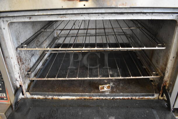 GREAT! Stainless Steel Commercial Gas Powered 10 Burner Range w/ 2 Lower Ovens and Stainless Steel Overshelf. 61x34x59 - Image 5 of 6