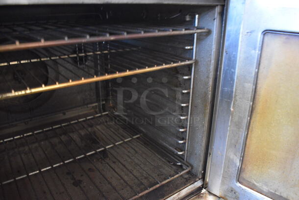 WHOA! Blodgett Model Single Deck Stainless Steel Commercial Full Size Convection Oven w/View Through Doors, Metal Oven Racks and Thermotactic Controls on Metal Legs. 38x41x56 - Image 8 of 10
