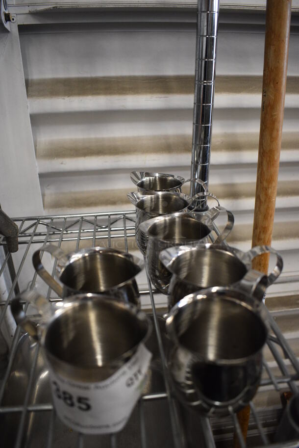 7 Metal Pitchers. 4x2.5x3. 7 Times Your Bid! - Image 1 of 4