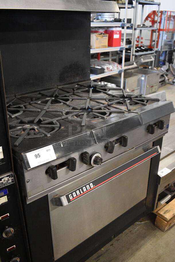 COOL! Garland Stainless Steel Commercial Gas Powered 6 Burner Range w/Lower Oven and Metal Over shelf. 36x31x59 - Image 2 of 6