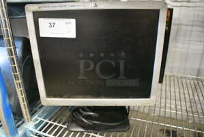 17" HP Monitor and ASUS 19" Monitor. 2x Your Bid!