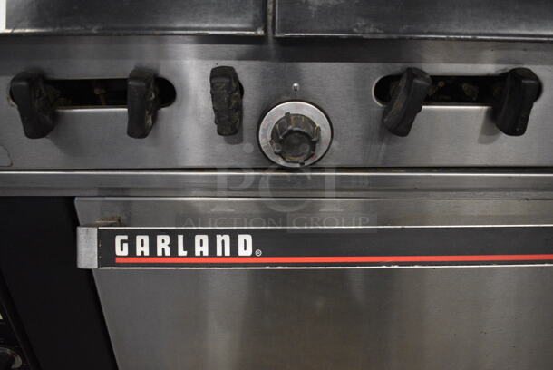 COOL! Garland Stainless Steel Commercial Gas Powered 6 Burner Range w/Lower Oven and Metal Over shelf. 36x31x59 - Image 5 of 6
