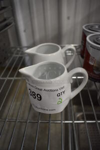 2 White Ceramic Pitchers. 4.5x3x3. 2 Times Your Bid!