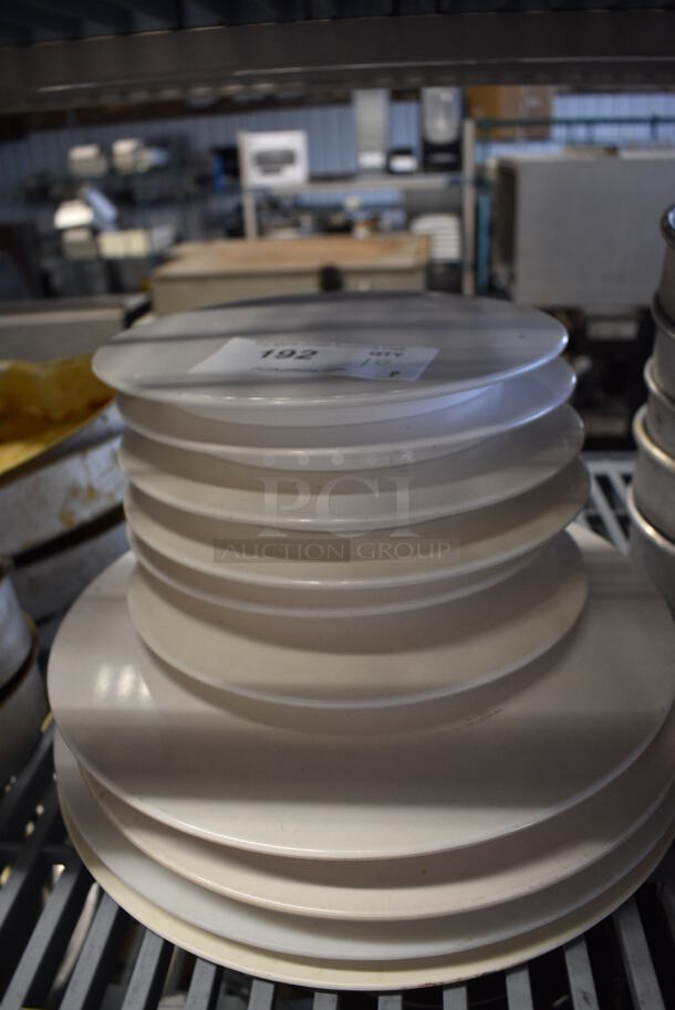 10 White Poly Round Stands. Includes 9.5x9.5x1. 10 Times Your Bid!