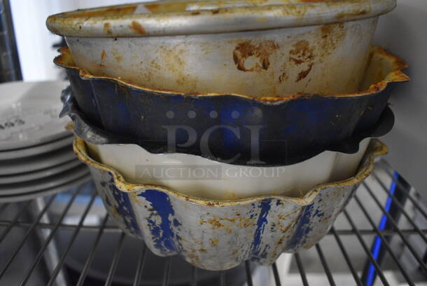 4 Various Metal Bundt Cake Pans. 9.5x9.5x4. 4 Times Your Bid! - Image 2 of 3