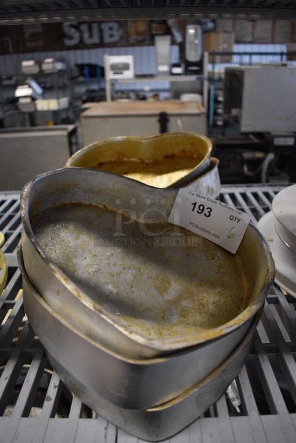 6 Metal Heart Shaped Baking Pans. Includes 10.5x10.5x2. 6 Times Your Bid! - Image 1 of 5