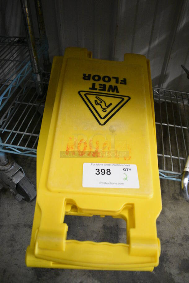 2 Yellow Poly Wet Floor Caution Signs. 10x1x26. 2 Times Your Bid!