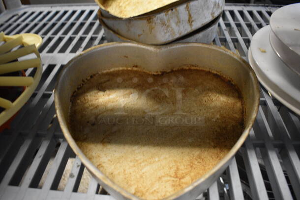 6 Metal Heart Shaped Baking Pans. Includes 10.5x10.5x2. 6 Times Your Bid! - Image 3 of 5