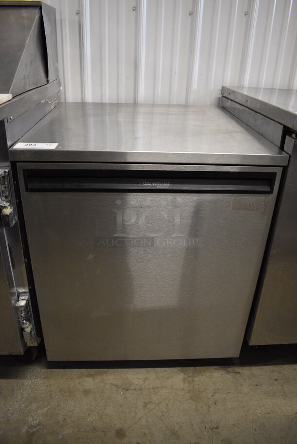NICE! Delfield Model 407 Stainless Steel Commercial Single Door Undercounter Freezer on Commercial Casters. 115 Volts, 1 Phase. 27x28.5x32. Tested and Powers On But Temps at 38 Degrees