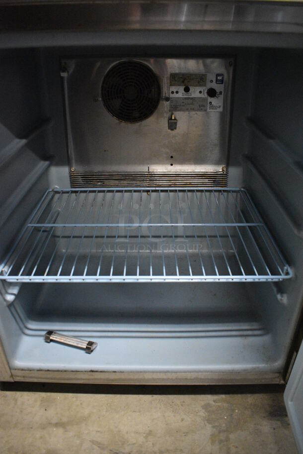 NICE! Delfield Model 407 Stainless Steel Commercial Single Door Undercounter Freezer on Commercial Casters. 115 Volts, 1 Phase. 27x28.5x32. Tested and Powers On But Temps at 38 Degrees - Image 5 of 7