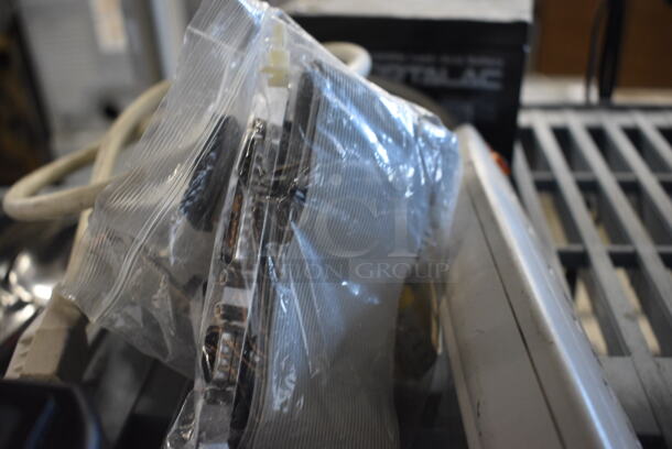 ALL ONE MONEY! Includes Surge Protector, Rechargeable Battery and Batter Charger. - Image 4 of 5