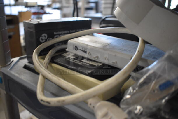 ALL ONE MONEY! Includes Surge Protector, Rechargeable Battery and Batter Charger. - Image 5 of 5
