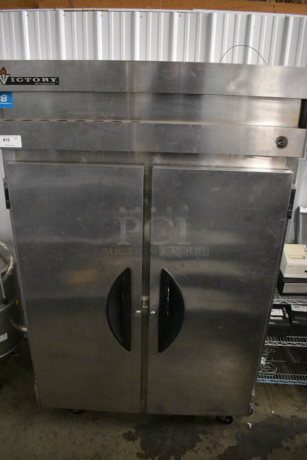 GREAT! 2007 Victory Model VR-2 Stainless Steel Commercial 2 Door Reach In Cooler on Commercial Casters. 115 Volts, 1 Phase. 52.5x34x83.5. Tested and Working!