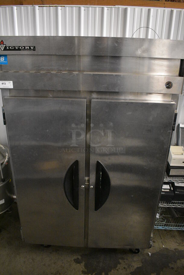 GREAT! 2007 Victory Model VR-2 Stainless Steel Commercial 2 Door Reach In Cooler on Commercial Casters. 115 Volts, 1 Phase. 52.5x34x83.5. Tested and Working! - Image 1 of 7