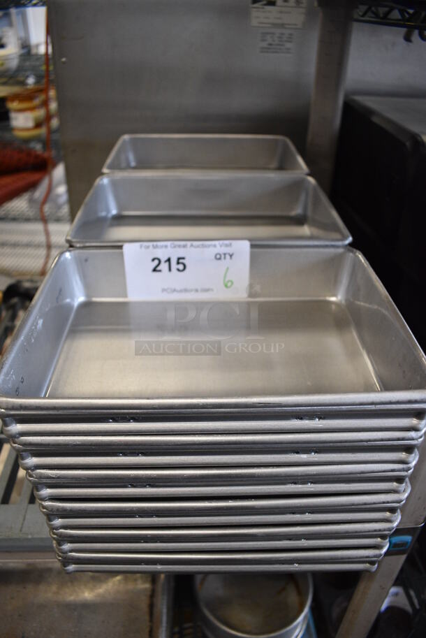 6 Metal 3 Loaf Baking Pans. 22x10x2. 6 Times Your Bid!