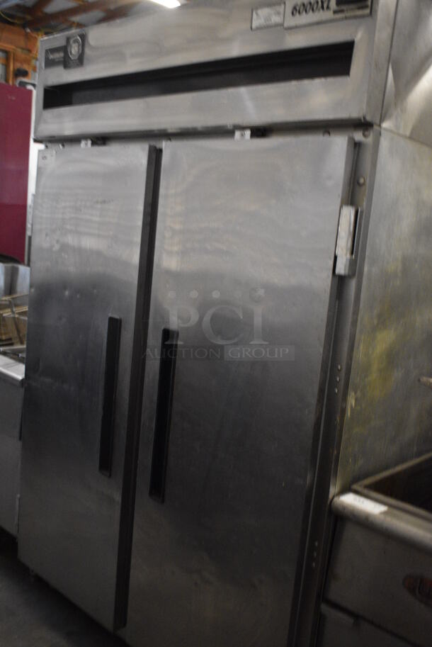 GREAT! Delfield Model 6151XL-S Stainless Steel Commercial 2 Door Reach In Freezer w/ Poly Coated Racks on Commercial Casters. 115 Volts, 1 Phase. 51x32x80. Tested and Working! - Image 2 of 6