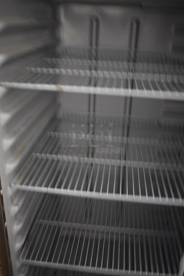 GREAT! Delfield Model 6151XL-S Stainless Steel Commercial 2 Door Reach In Freezer w/ Poly Coated Racks on Commercial Casters. 115 Volts, 1 Phase. 51x32x80. Tested and Working! - Image 4 of 6