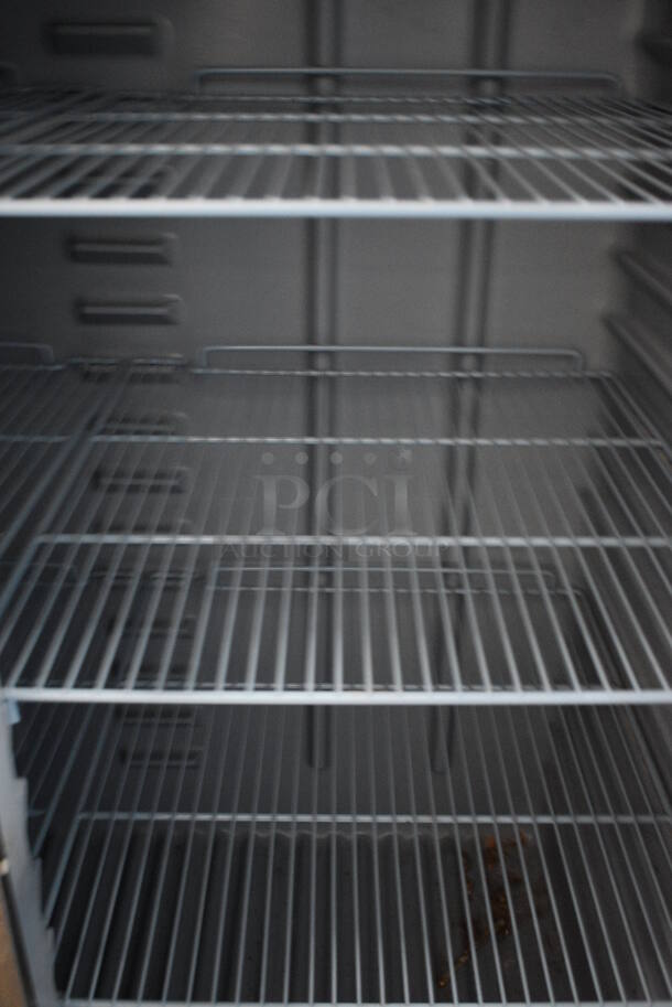 GREAT! Delfield Model 6151XL-S Stainless Steel Commercial 2 Door Reach In Freezer w/ Poly Coated Racks on Commercial Casters. 115 Volts, 1 Phase. 51x32x80. Tested and Working! - Image 5 of 6