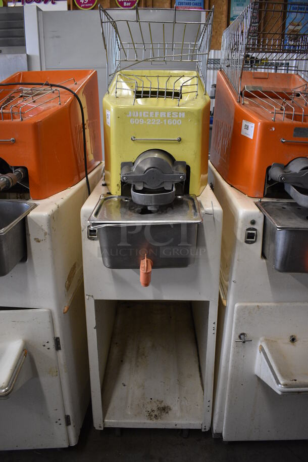 WOW! Juice Tree Model 105-G Metal Commercial Floor Style Citrus Juicer on Commercial Casters. 115 Volts, 1 Phase. 18x46x67. Tested and Does Not Power On