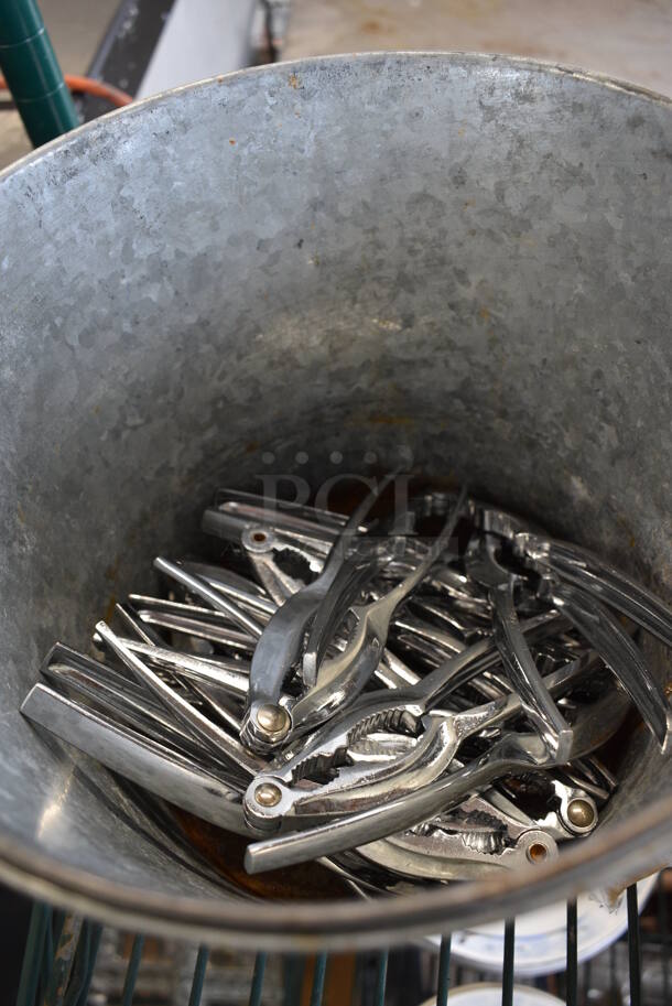 ALL ONE MONEY! Lot of Metal Claw Crackers in Metal Bucket! 6" - Image 1 of 4