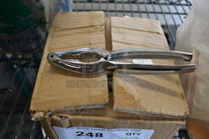 23 BRAND NEW IN BOX! Metal Claw Crackers. 6". 23 Times Your Bid!