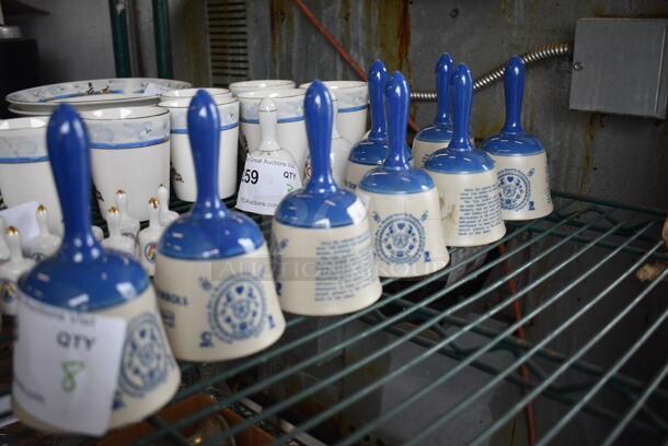 8 White and Blue Ceramic Bells. 3x3x5.5. 8 Times Your Bid!