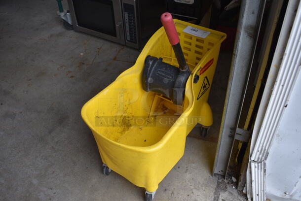 Rubbermaid Yellow Poly Mop Bucket w/ Wringing Attachment on Casters. 13x22x27 - Image 2 of 3