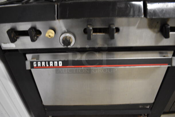 NICE! Garland Stainless Steel Commercial Gas Powered 6 Burner Range w/ Lower Oven and Stainless Steel Overshelf. 36x31x59 - Image 4 of 5